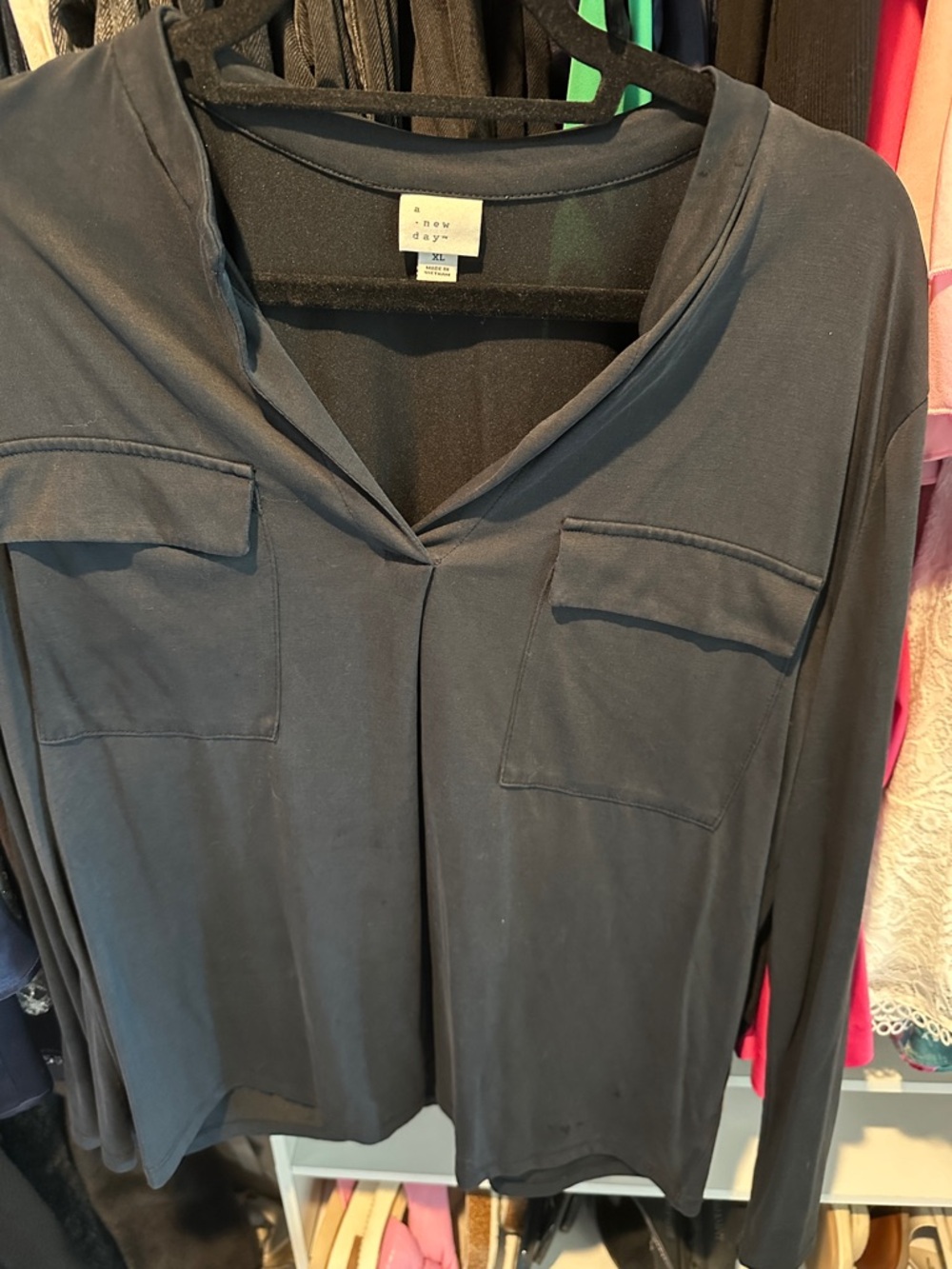 A New DayBlack Long Sleeve Pocket V-Neck Top